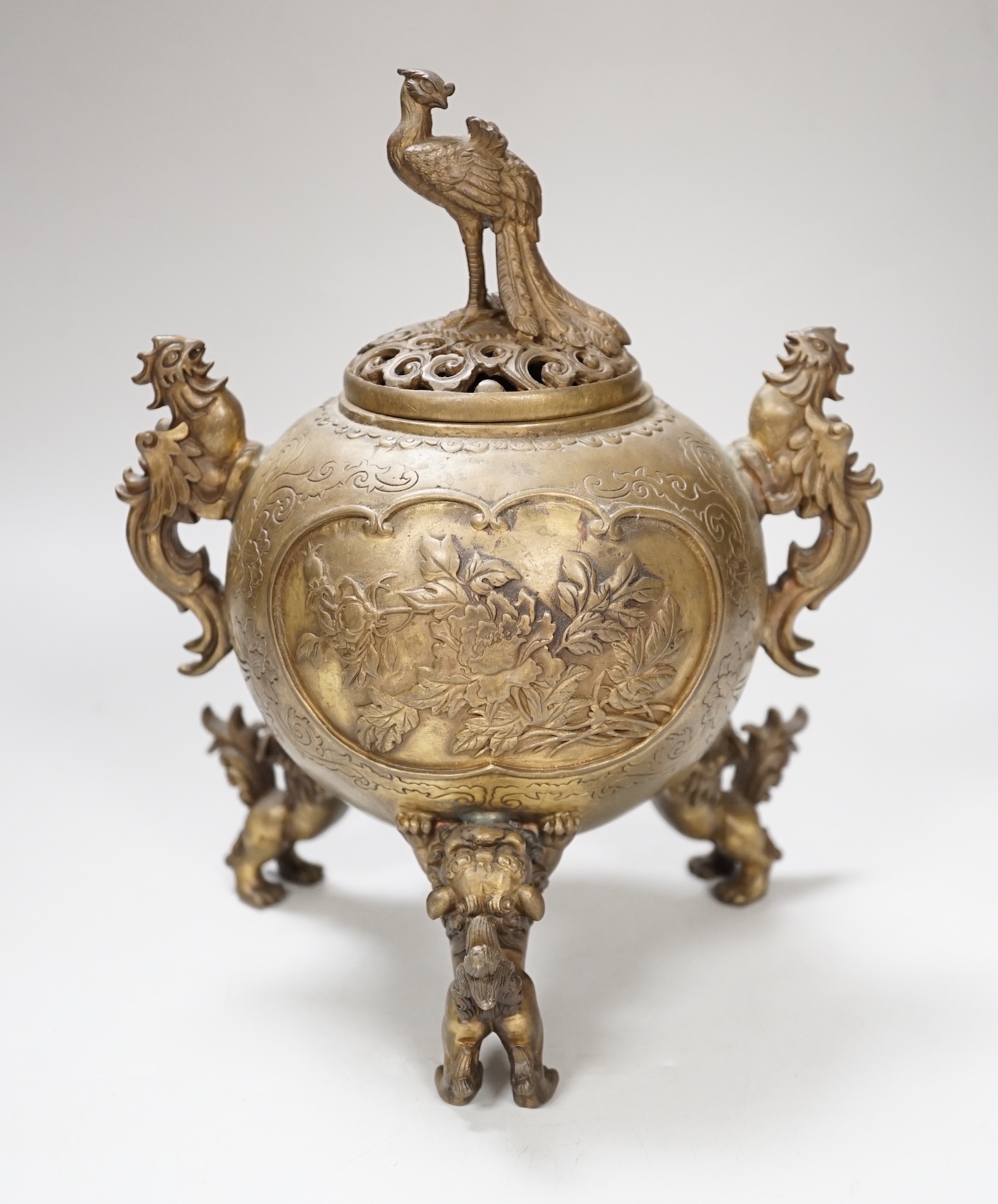A Japanese bronze shi-shi footed censer and cover, 22cm high